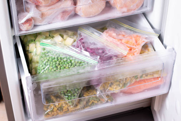 Home assortment of frozen vegetables in home fridge. frozen food in the freezer